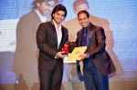 Prof. Chaudhuri awarding Arjun Kapoor at the launch of PowerBrands Rising Stars 2012-13 in Dubai on 29th Aug 2012.jpg